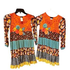 ZaZa Couture Twin Girls split size fall dresses, one 6 and one 7. EUC.